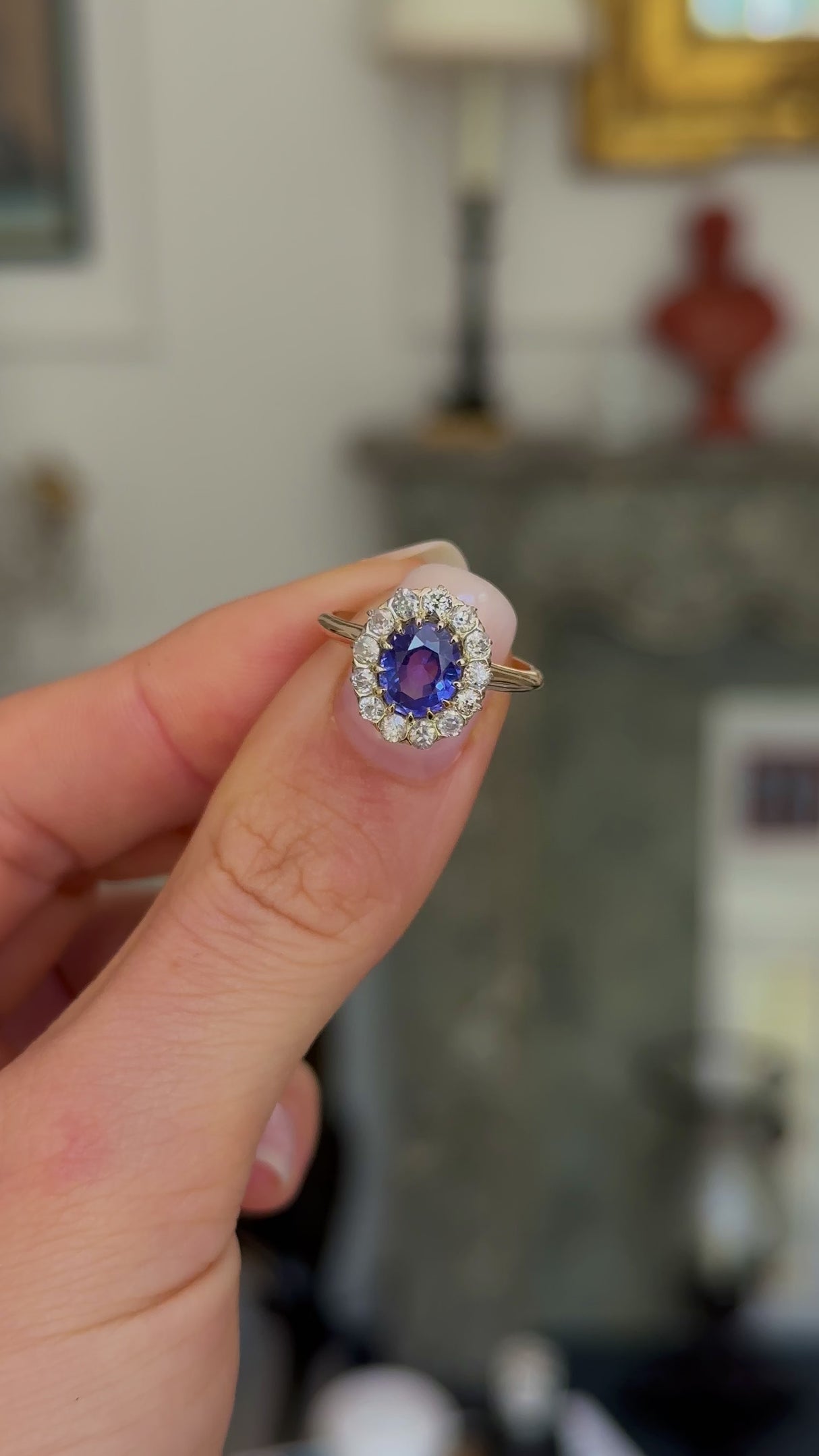 Antique, colour change oval sapphire and diamond cluster engagement ring