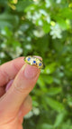 Antique, Victorian Three-Stone Sapphire Gypsy Ring, 18ct Yellow Gold held in fingers.