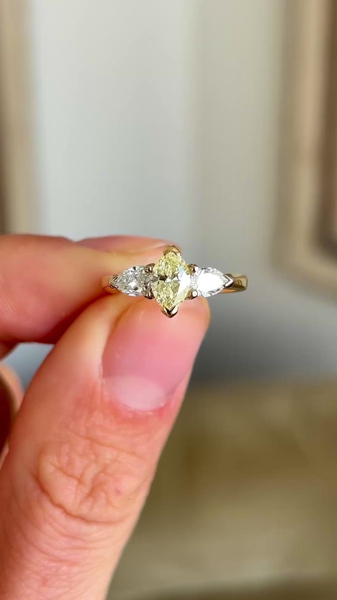 Vintage, yellow & white diamond three-stone ring
