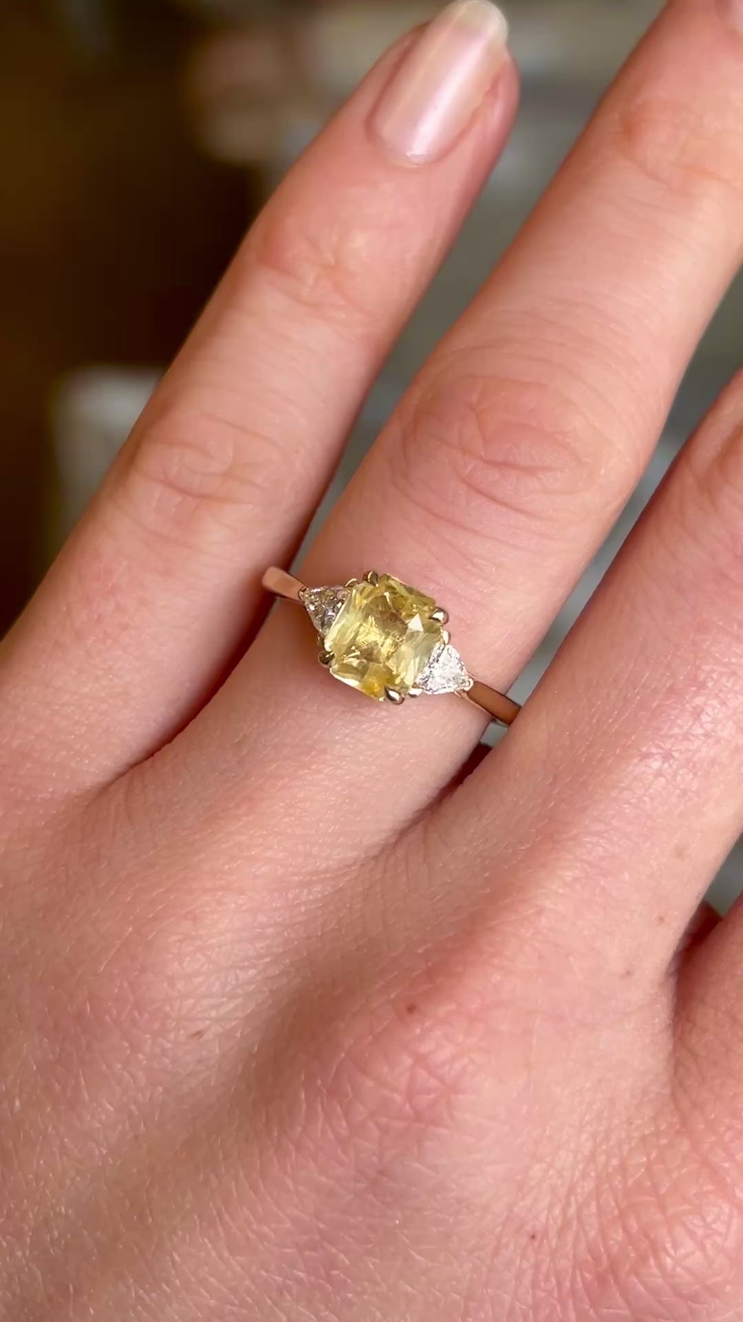 Yellow sapphire and diamond three-stone ring