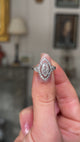 Vintage tiffany & co diamond ring, held in fingers and moved around to give perspcective.