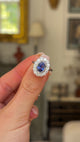 2.5ct oval blue sapphire and diamond cluster ring, 18ct white gold