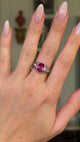 vintage pink sapphire, diamond and platinum ring worn on hand and moved around to give perspective.