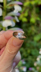 Vintage, 1980s diamond solitaire engagement ring on hand.