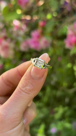 Vintage, 1960s Diamond Engagement Ring, 18ct Yellow Gold and Platinum held in fingers.
