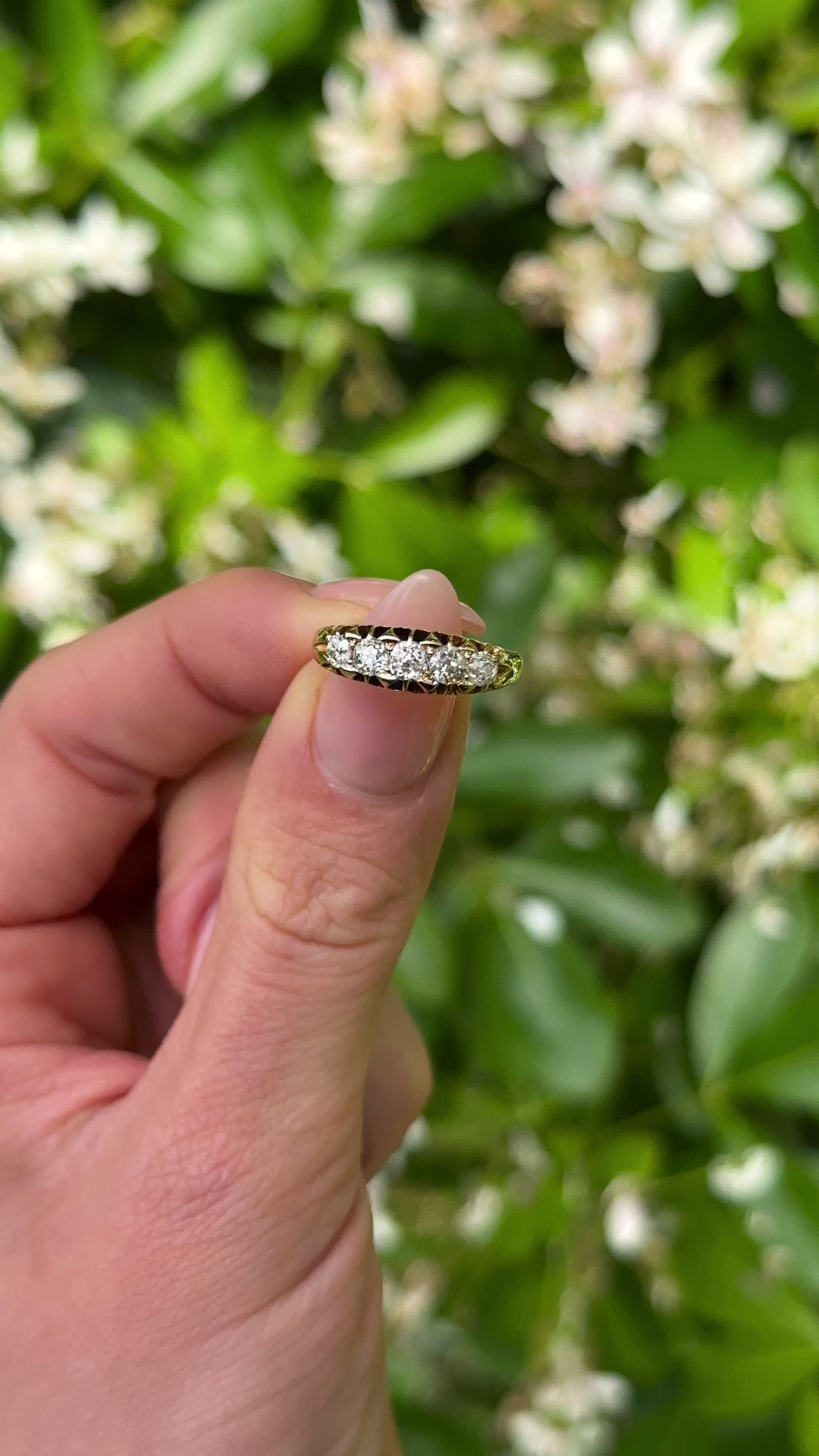 Antique, Victorian Five-Stone Diamond Engagement Ring, 18ct Yellow Gold held in fingers.