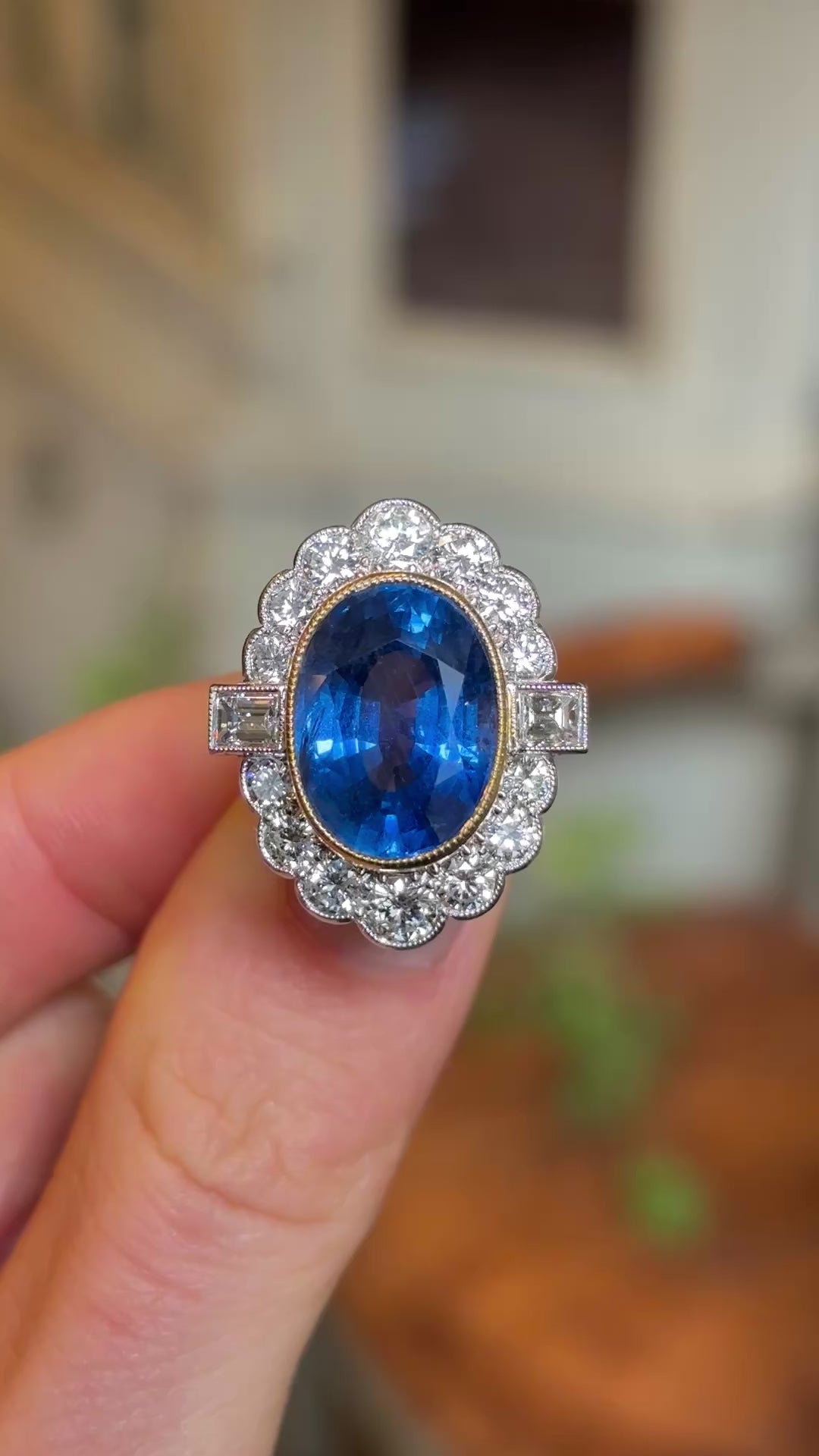 Vintage, 9.50ct oval-cut sapphire and diamond cluster ring