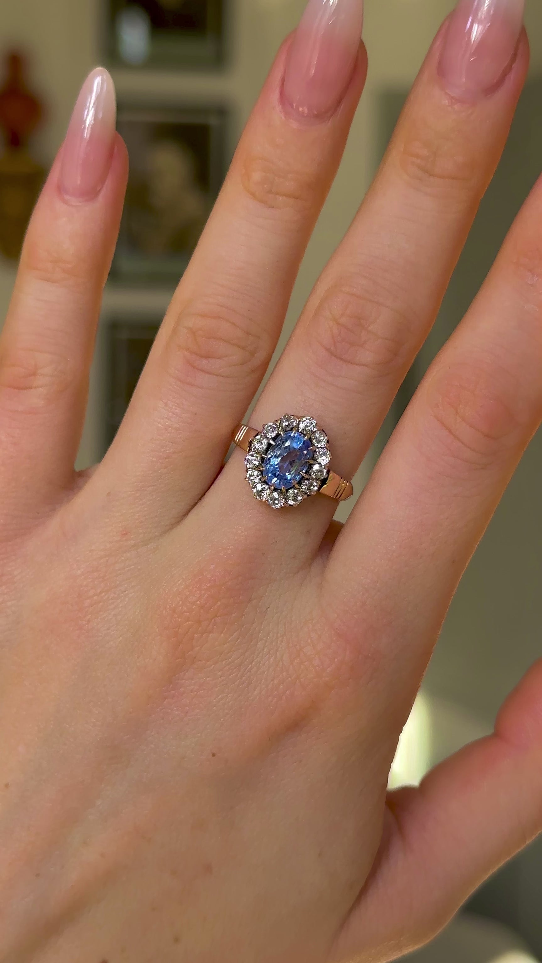 Antique, Edwardian Sapphire and Diamond Cluster Ring, 14ct Yellow Gold worn on hand and rotated to give perspective.