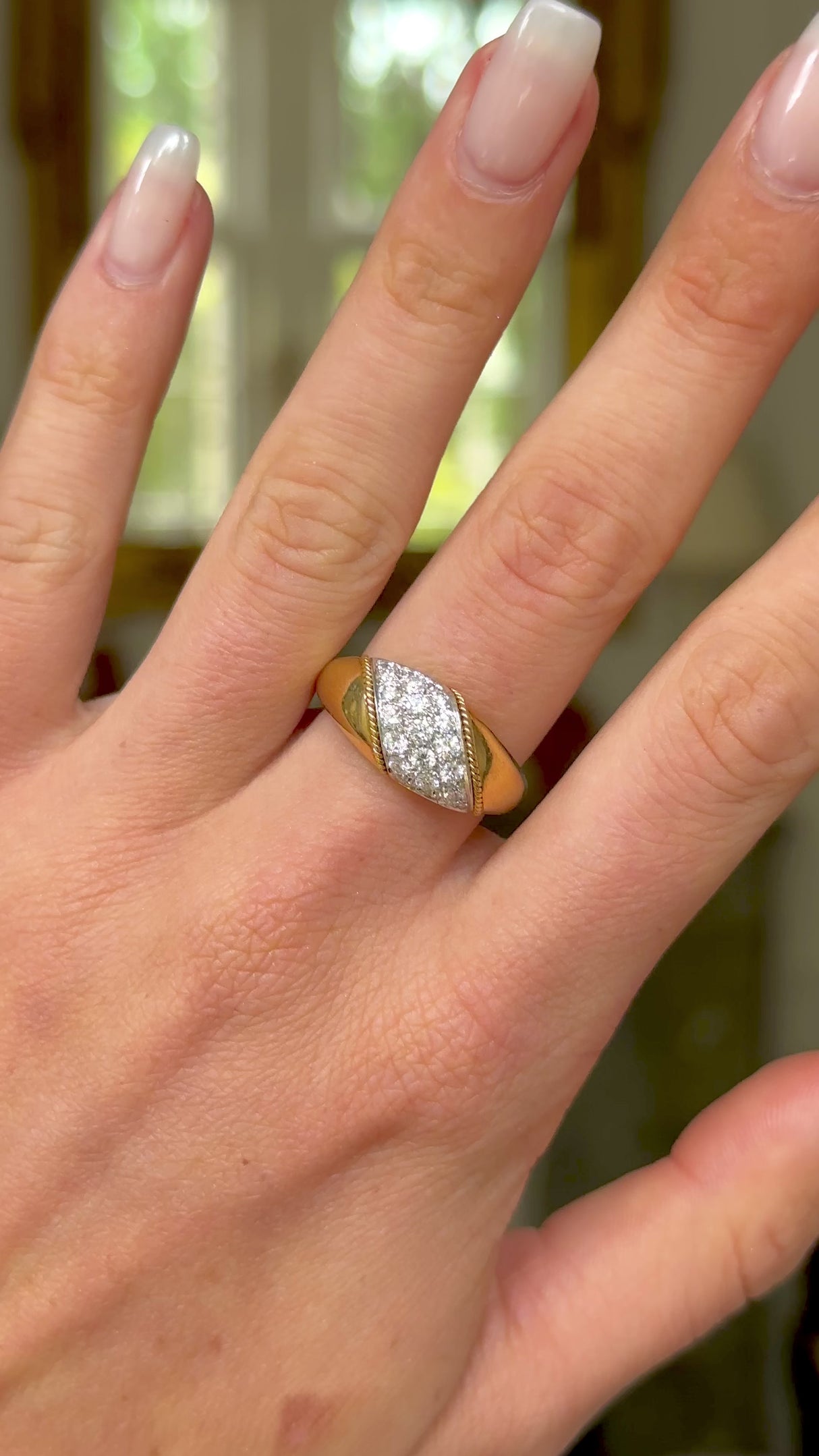 Asprey diamond and yellow gold band, worn on hand and moved around to give perspective.