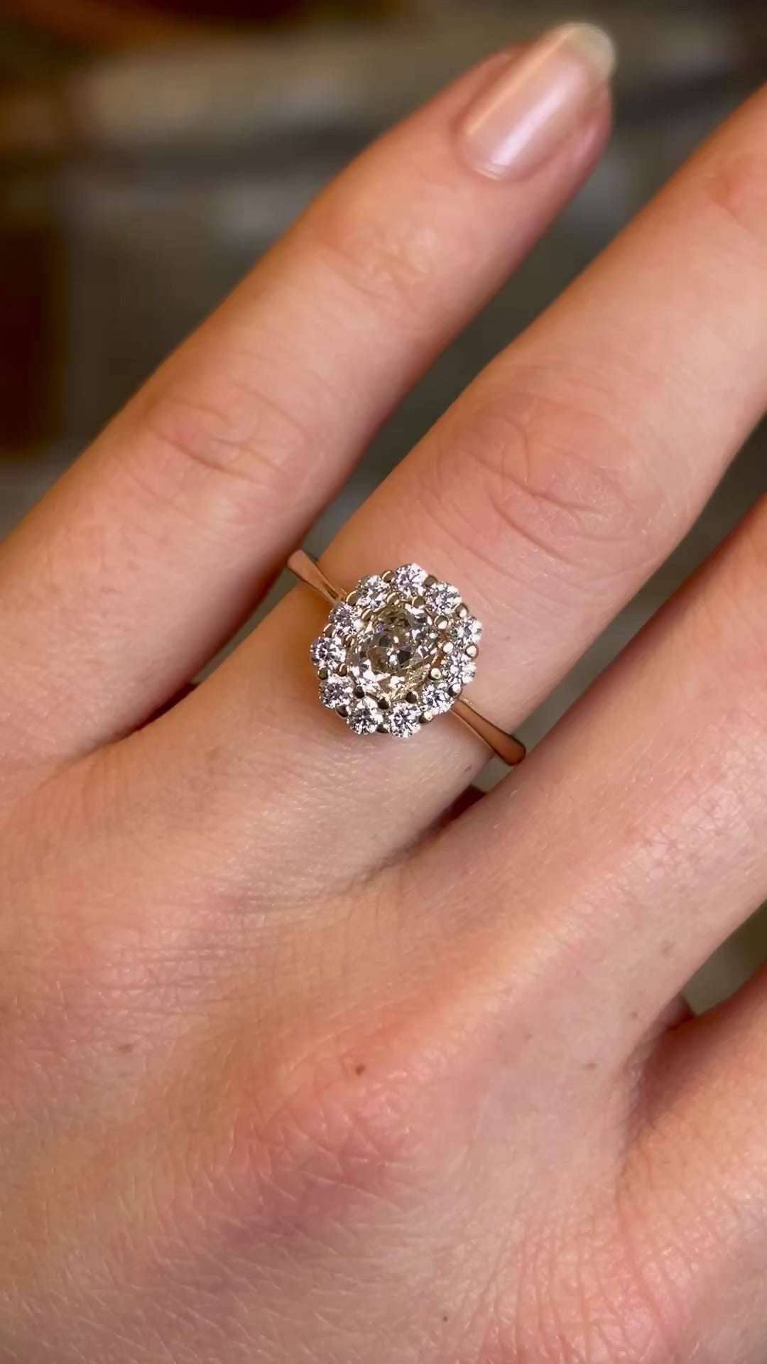 Video showing all angles of the yellow-brown tinted old mine-cut diamond cluster engagement ring with a vintage-inspired design, captured in natural light.