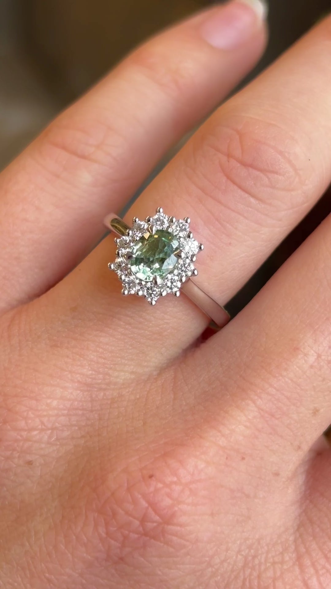 Oval-cut green sapphire & diamond cluster ring