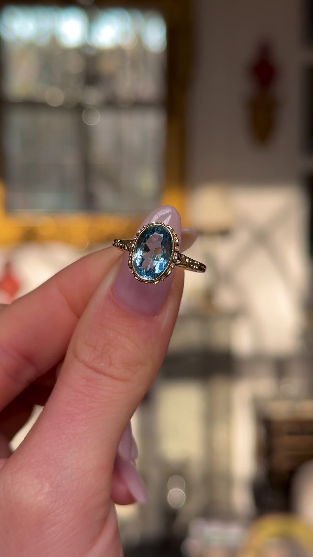 Antique, oval-cut aquamarine single stone ring