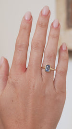 Video showcasing the sky-blue sapphire ring on the hand as light travels across the stone’s crisp facets.
