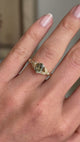 Vintage-inspired, sage green sapphire and diamond engagement ring