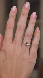 Video showcasing the oval blue sapphire and diamond ring on the hand, capturing the gemstone’s soft blue sparkle.