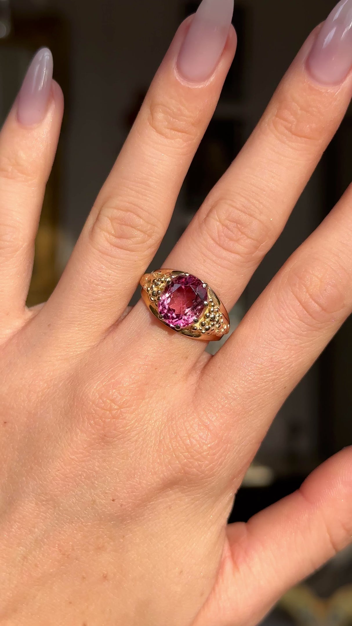Victorian antique pink tourmaline ring worn on hand and moved around to give perspective.