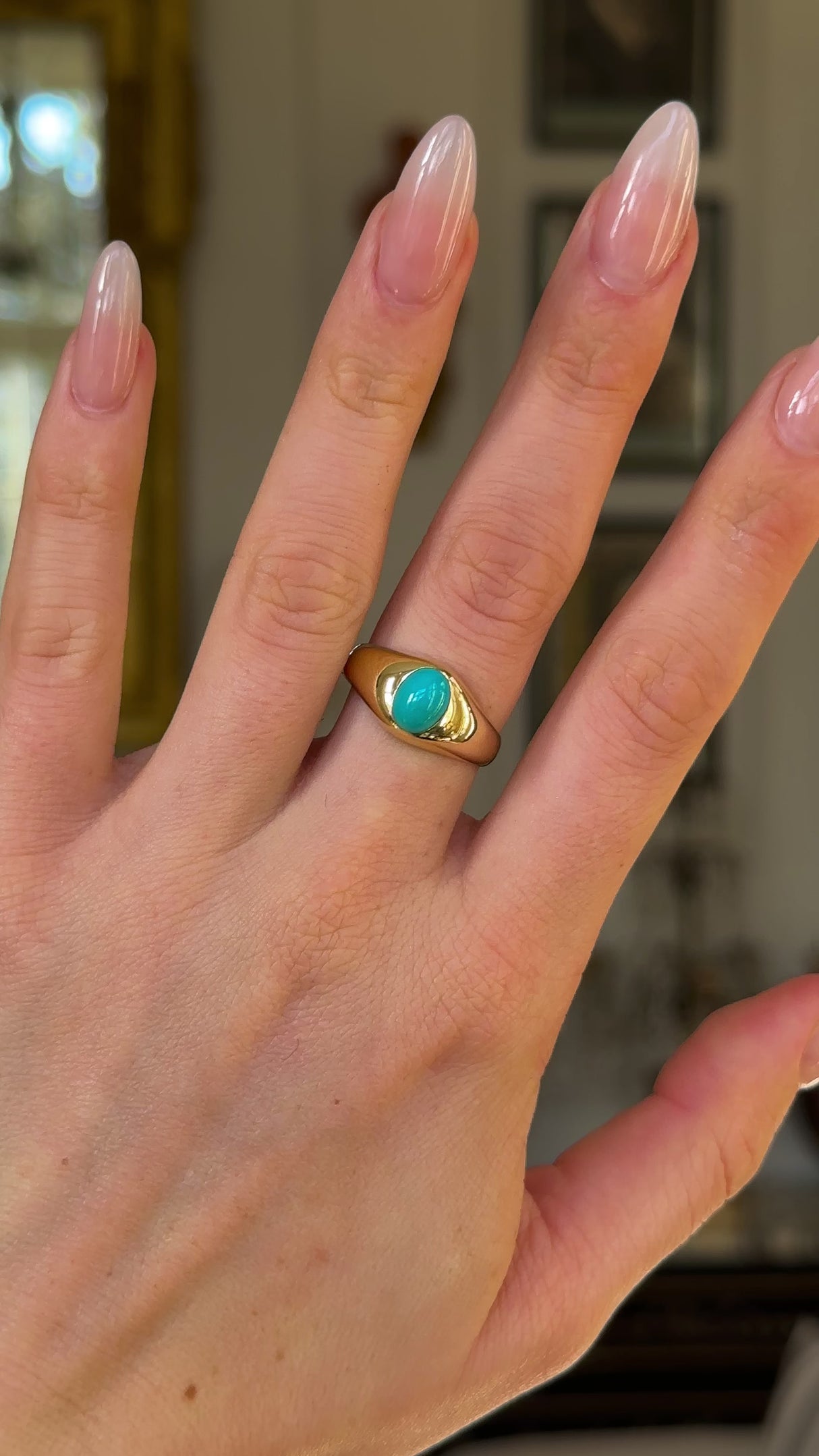 Antique, Single-Stone Turquoise Gypsy Ring, 18ct Yellow Gold worn on hand and rotated to give perspective.