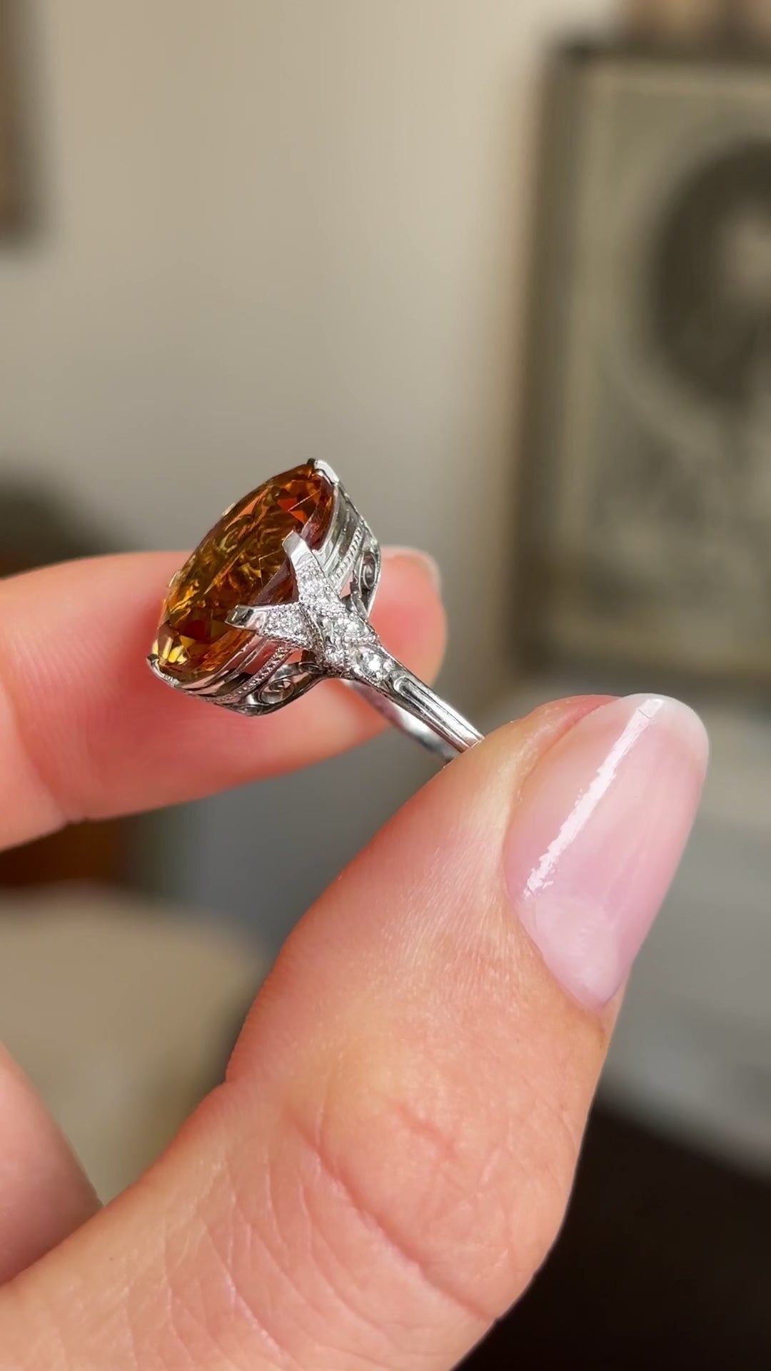 Close up video of a platinum citrine & diamond cocktail ring from the 1930s, Art Deco Antique.