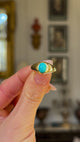 Antique, Single-Stone Turquoise Gypsy Ring, 18ct Yellow Gold held in fingers and rotated to give perspective.