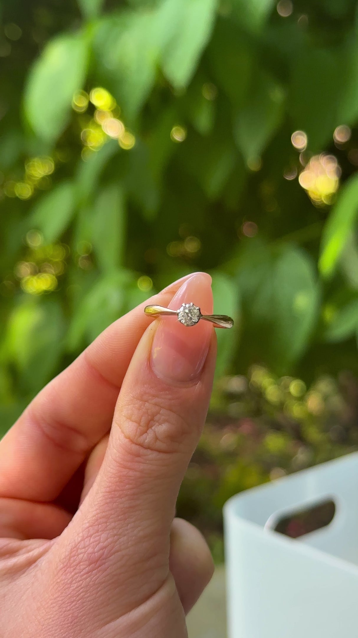 Antique, Edwardian Solitaire Diamond Engagement Ring, 18ct Yellow Gold held in fingers.