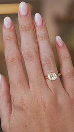 Video of an antique-inspired old-mine cut diamond engagement ring worn on the hand, highlighting its sparkle and elegant proportions.