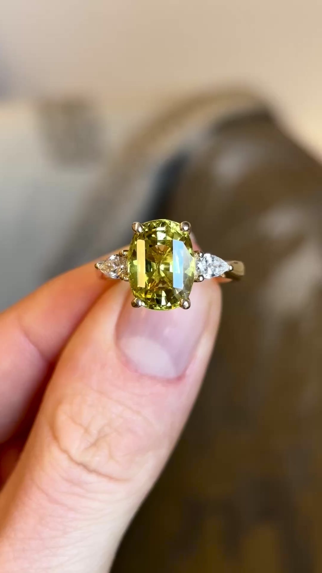 Chrysoberyl and pear-cut diamond three-stone ring