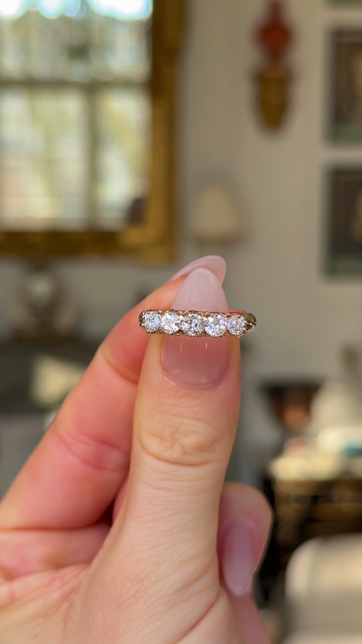 Antique, Diamond Half Hoop Ring, 18ct Rose Gold held in fingers and moved around to give perspective.