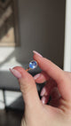 Antique-inspired, inky blue sapphire solitaire ring