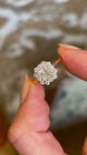 Diamond cluster engagement ring