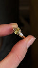Emerald-cut yellow sapphire and diamond three-stone ring
