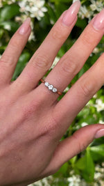 Vintage, 1950s Three-Stone Diamond Engagement Ring, 18ct Yellow Gold and Platinum worn on hand.