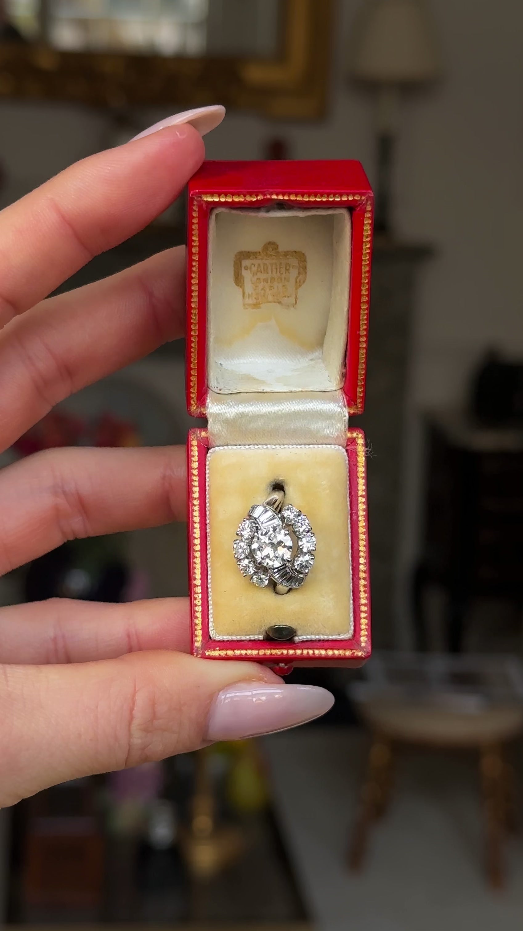 Cartier diamond engagement ring in box.  