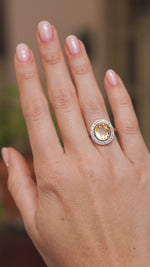 Video of an antique French citrine and rose-cut diamond cluster ring worn on the hand, capturing its size, sparkle and period design.