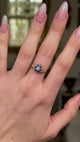 Antique, Edwardian Sapphire and Diamond Cluster Ring, worn on hand and moved around to give perspective.