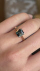 Square step-cut teal sapphire single-stone ring