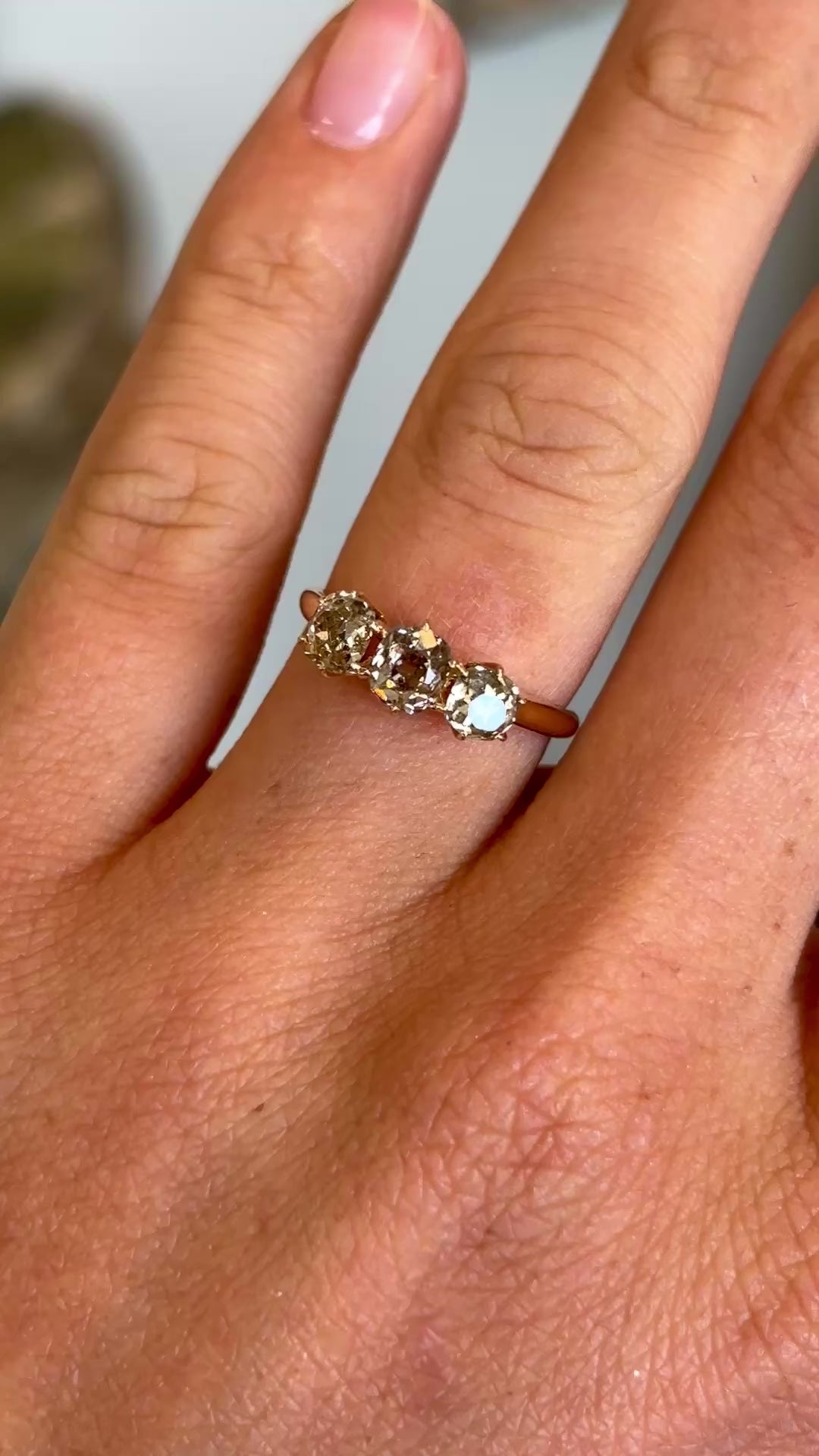 Antique, old-cut yellow-brown diamond three-stone ring