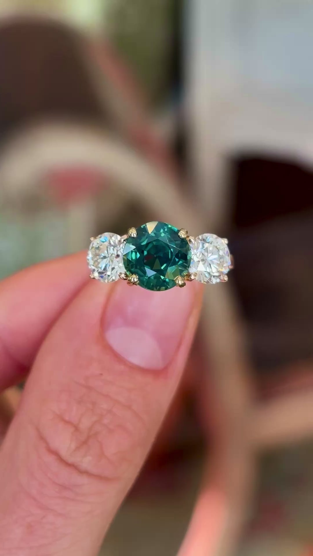 Vintage, teal sapphire and diamond three-stone engagement ring
