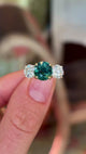 Vintage, teal sapphire and diamond three-stone engagement ring