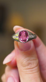 A video of the details of a platinum Vintage, 1940s pink sapphire and diamond gypsy ring.