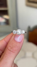 Video showcasing the profile of an Antique, Art Deco old-cut diamond three-stone engagement ring in platinum