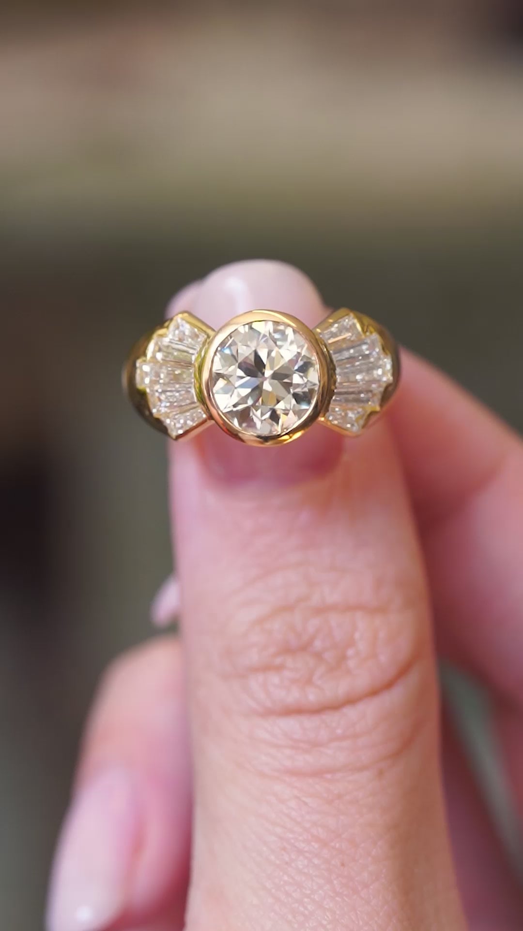 A video view of a vintage old-cut diamond fan engagement ring featuring an old-cut diamond.