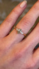 Pear-cut diamond three-stone engagement ring
