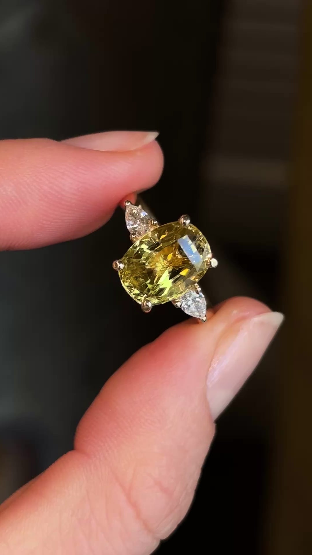 Chrysoberyl and pear-cut diamond three-stone ring