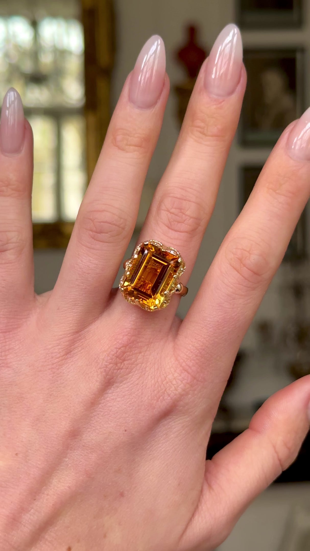 Antique, 1880s Citrine Ring with Rope Metal Work, worn on hand and rotated to give perspective.