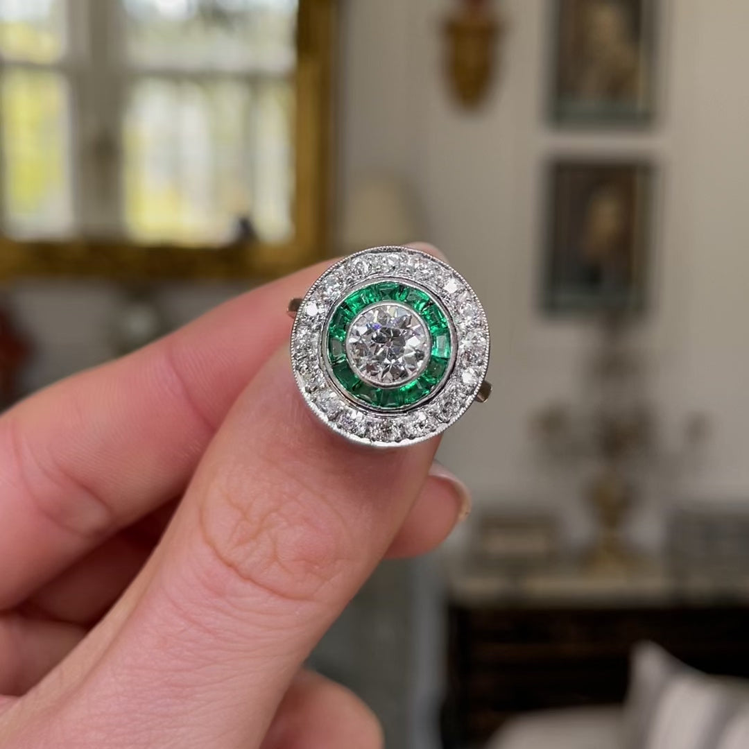Art Deco emerald diamond target cluster ring circa 1920s