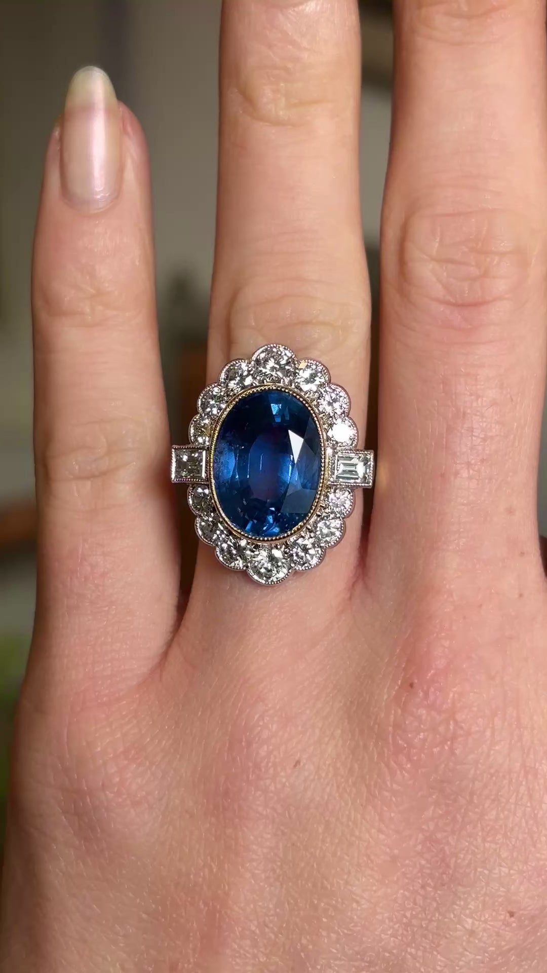 Vintage, 9.50ct oval-cut sapphire and diamond cluster ring