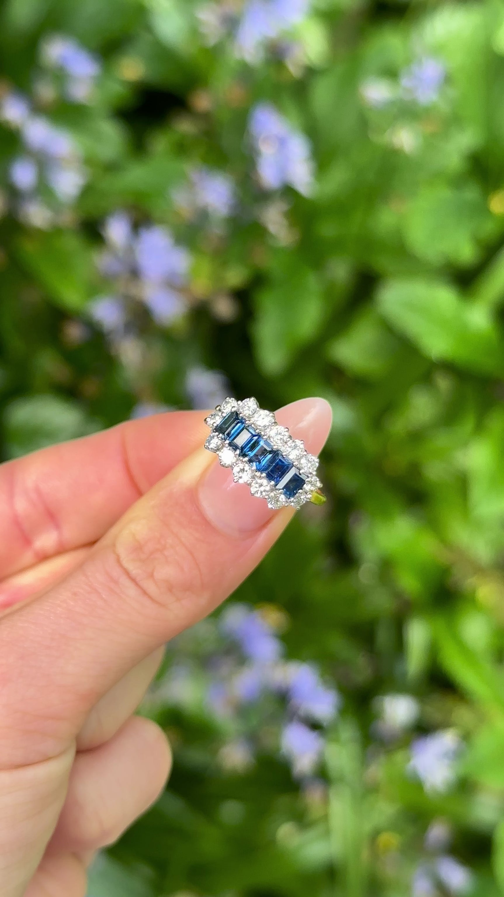  Vintage, 1950s Sapphire and Diamond Cocktail Ring, 18ct Yellow Gold and Platinum held in fingers.
