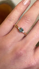 Teal sapphire and diamond three-stone engagement ring