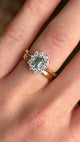 Octagon-cut green sapphire & diamond cluster engagement ring