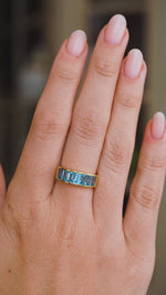 Vintage, 1980s Swiss blue topaz half eternity ring